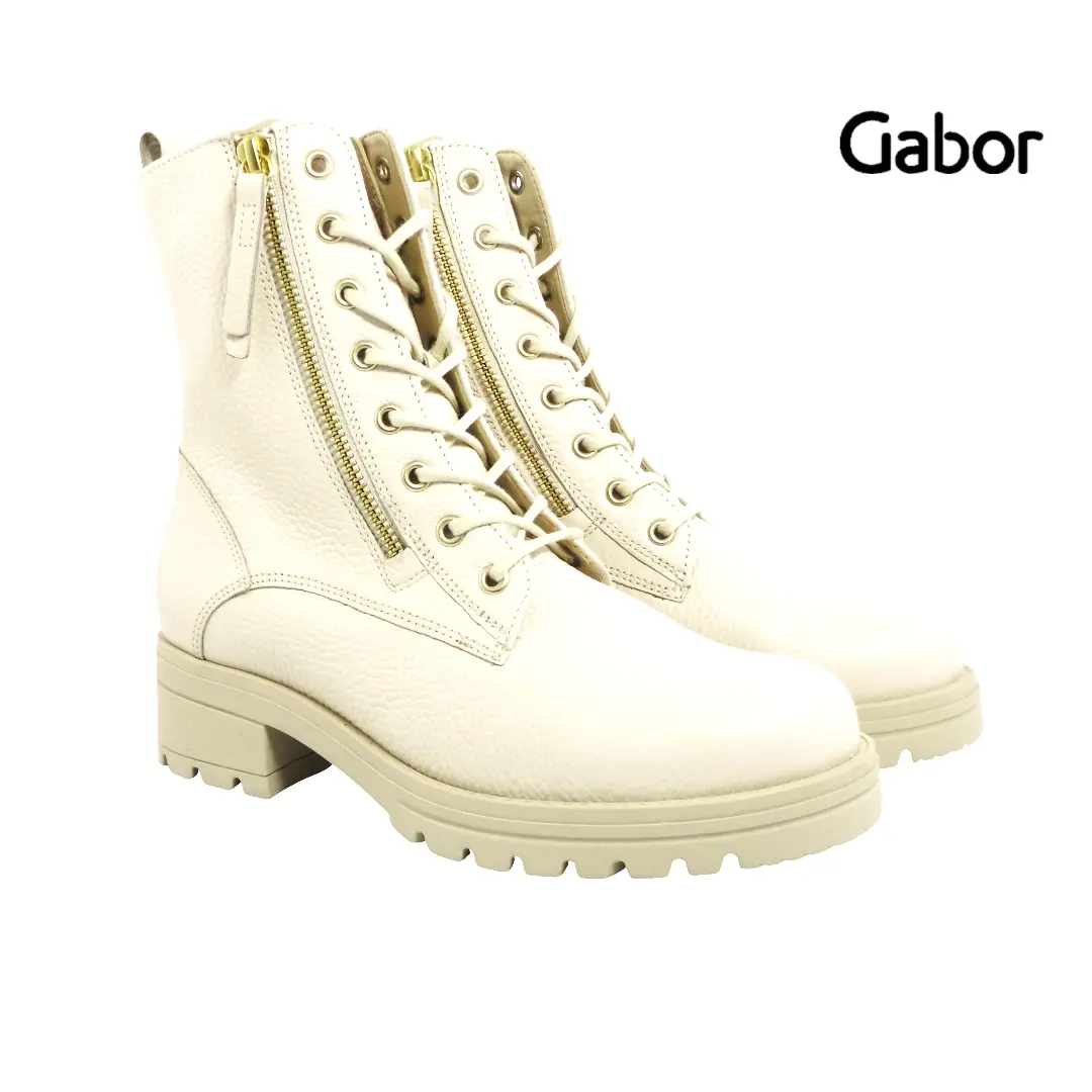 Crèmekleurige veterlaarzen van Gabor met gouden ritssluiting en grove zool voor extra comfort.