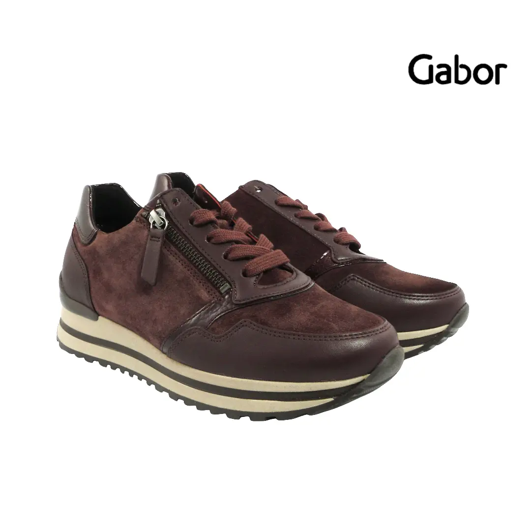 Merlotkleurige sneakers van Gabor met suède en leer, ritssluiting, veters en sportieve tweekleurige zool.