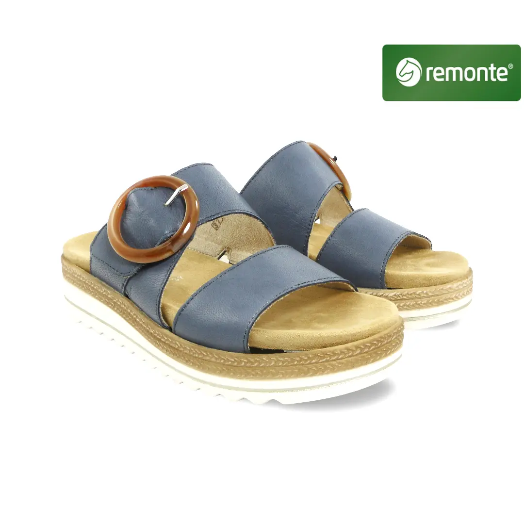 Remonte D0Q51 dames comfortslipper in denimblauw met brede banden en lichte zool.