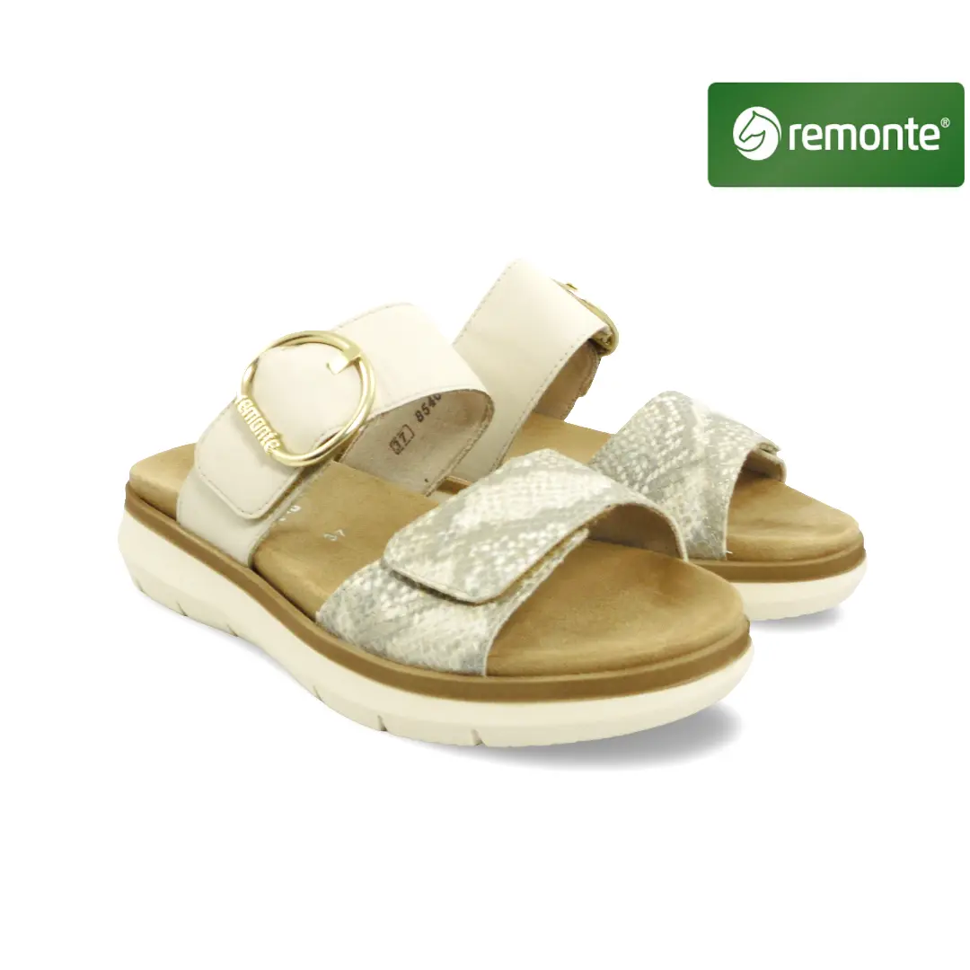 Remonte D2K57-60 dames comfortslipper in offwhite met goudaccenten en brede banden.